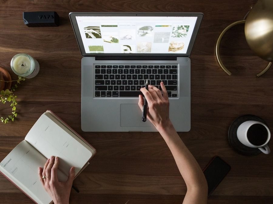 Working through notes at a laptop